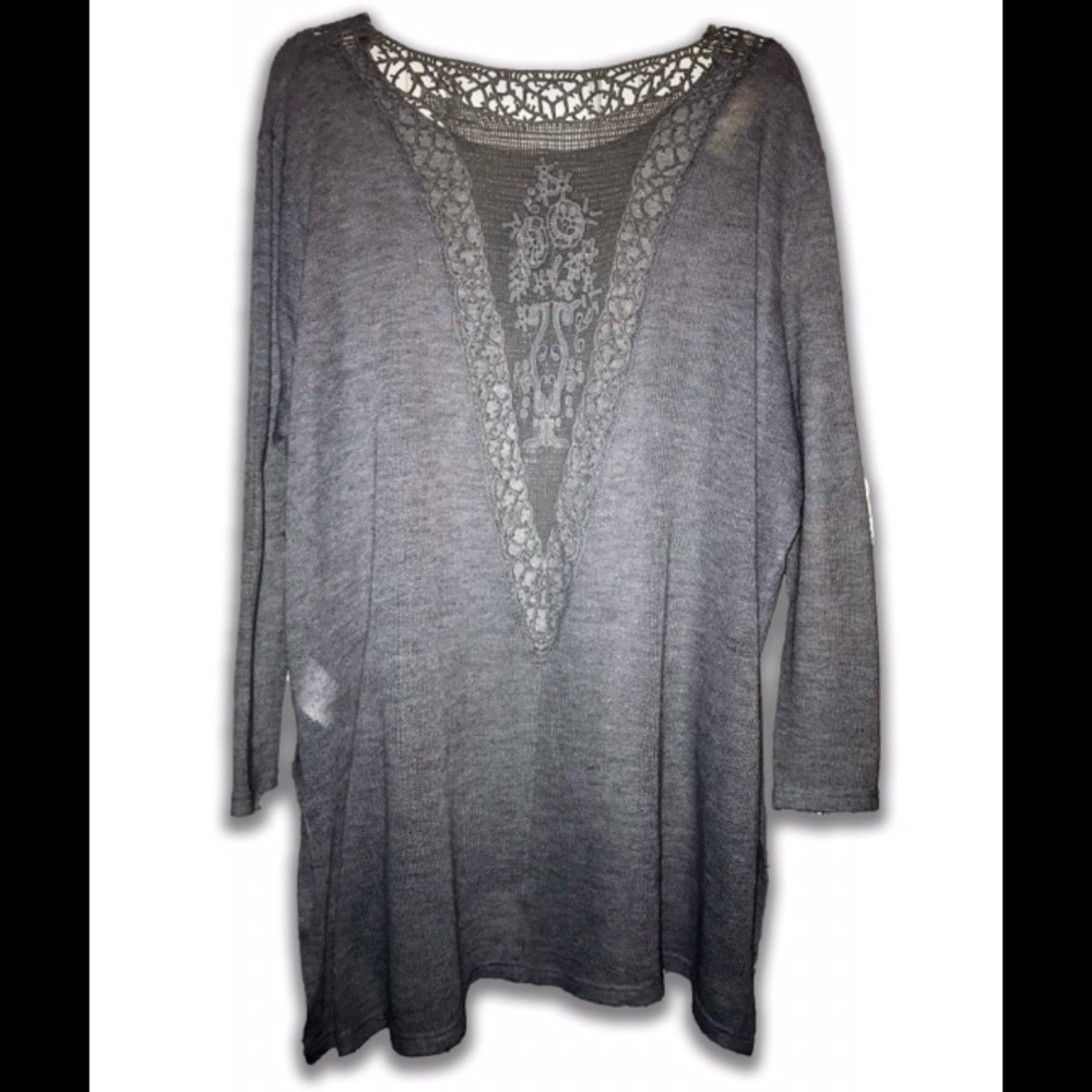 Sweater with crocheted back